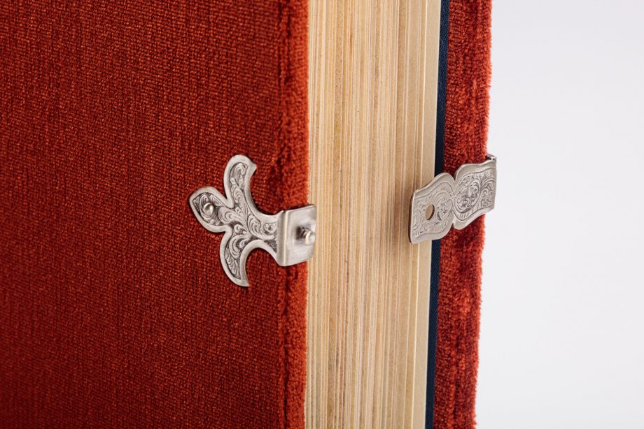 finely graved silver clasp shaped as the French fleur-de-lys of the book cover from the Berry Apocalypse from The Morgan Library & Museum in New York, MS M.133; Paris, around 1410